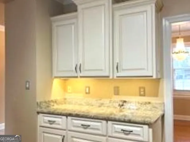 a bathroom with a shower and a toilet