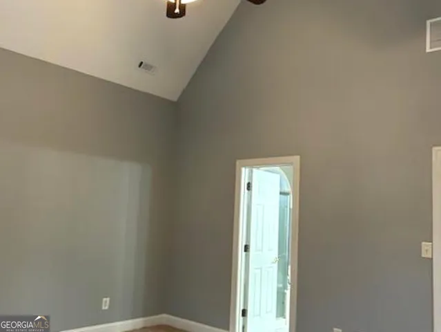 a front view of a house with large windows