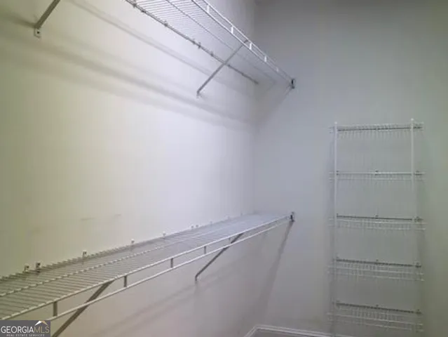 a view of a room that has a window in it