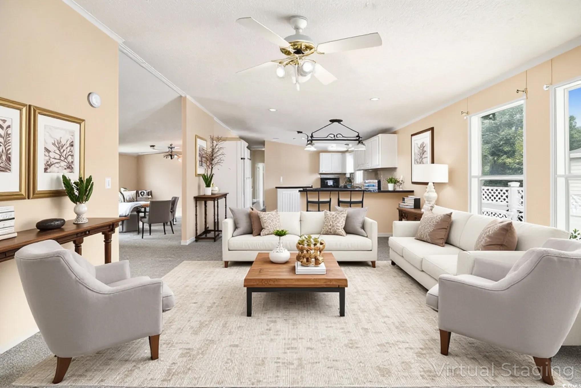 3804 Stern Drive Conway, SC 29526 - Photo 11 of 38 Living area featuring ceiling fan, light carpet, and crown molding