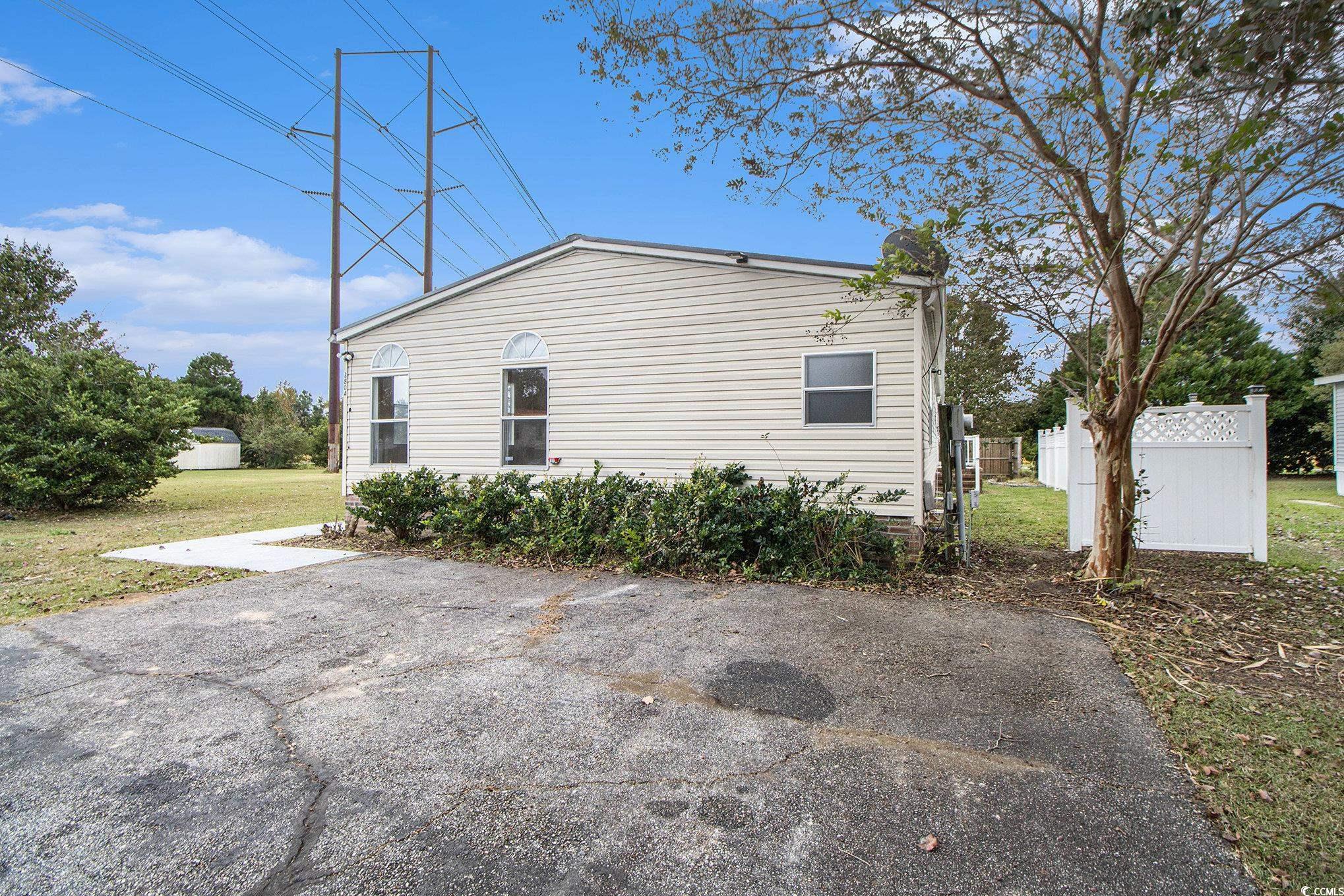 3804 Stern Drive Conway, SC 29526 - Photo 33 of 38 View of home's exterior with a yard