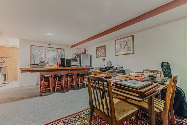 a view of a workspace with furniture