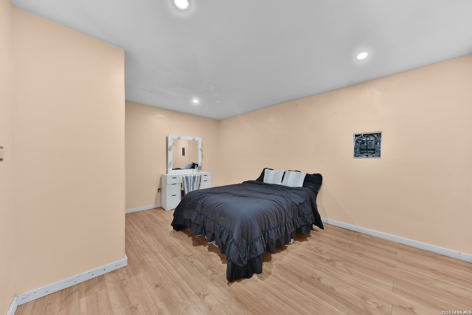 122 Brink Center Point, TX 78010 - Photo 17 of 40 a bedroom with a bed and a painting on the wall