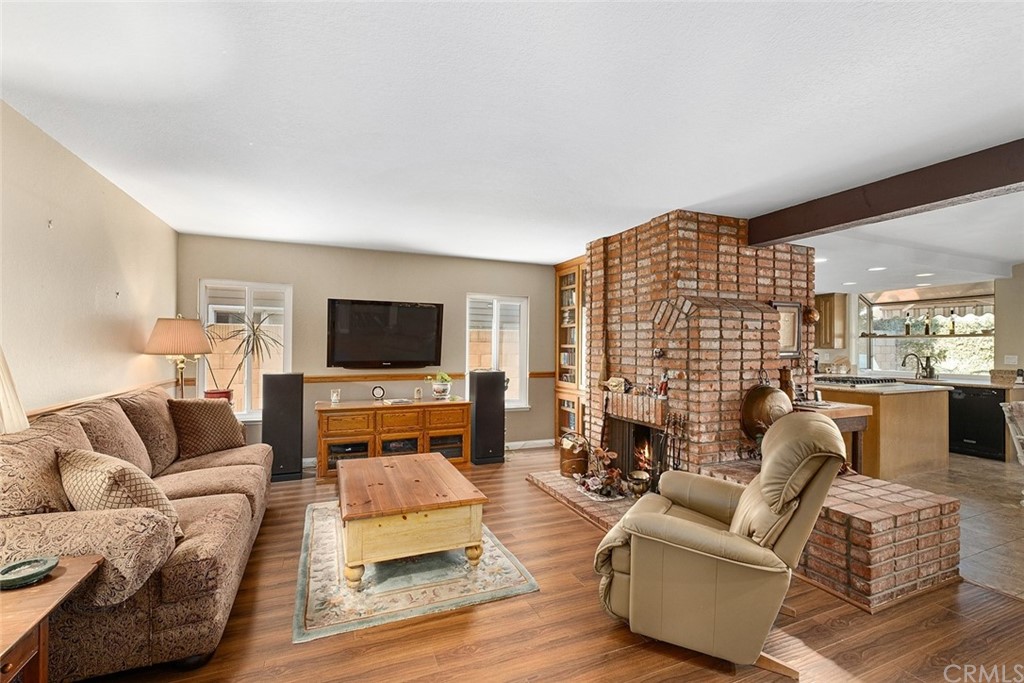 3 Descanso Irvine, CA 92620 - Photo 18 of 54 a living room with furniture or couch and a flat screen tv