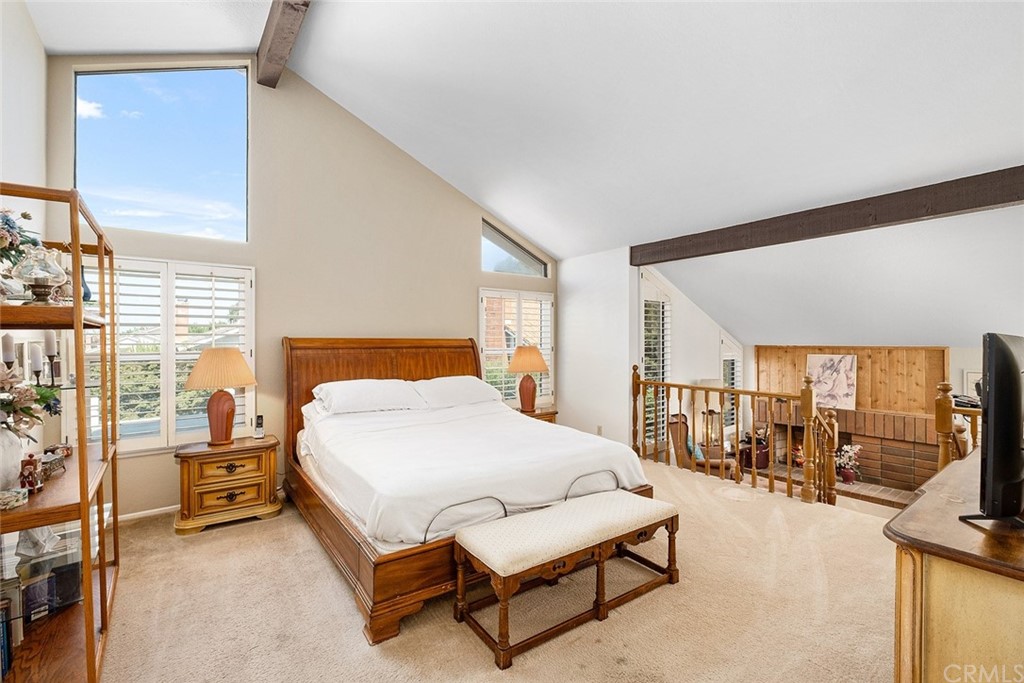 3 Descanso Irvine, CA 92620 - Photo 25 of 54 a bedroom with a bed a lamp and large windows