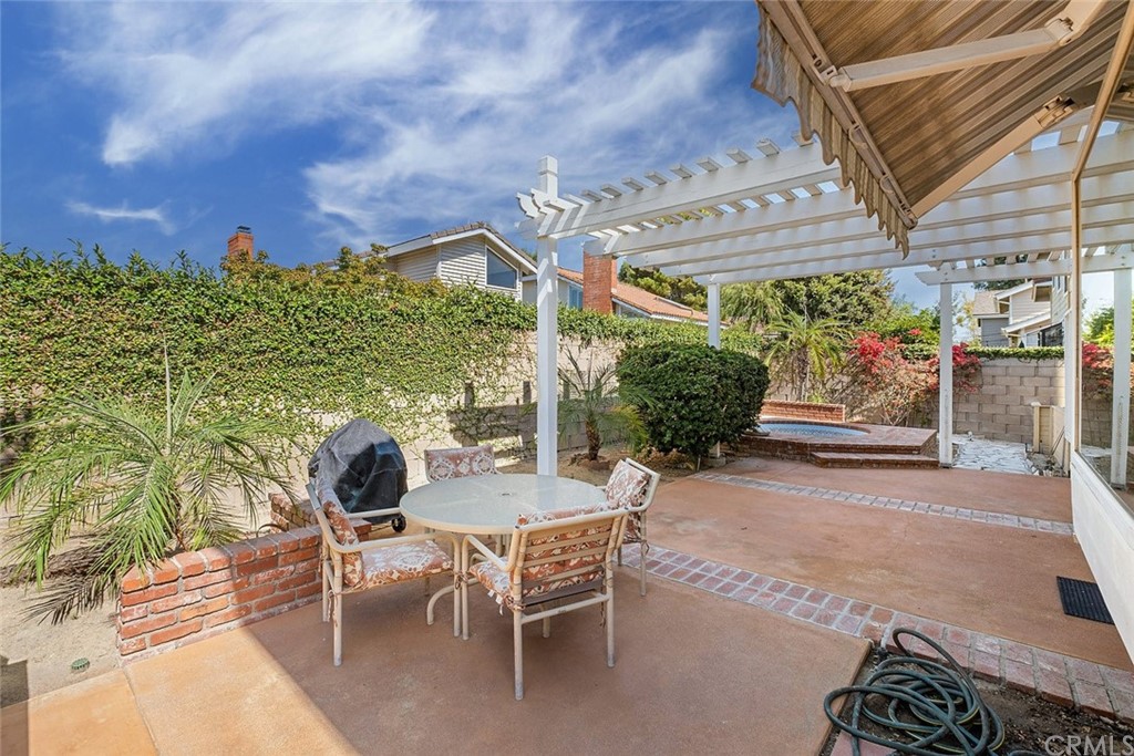 3 Descanso Irvine, CA 92620 - Photo 36 of 54 a view of a patio with table and chairs and potted plants