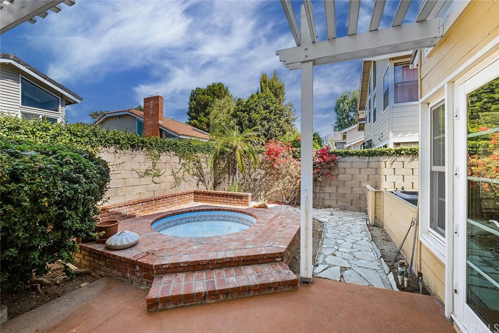 3 Descanso Irvine, CA 92620 - Photo 37 of 54 a backyard of a house with yard and outdoor seating