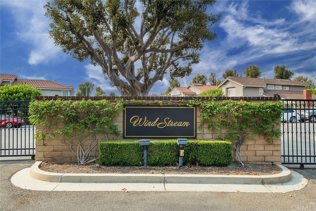 3 Descanso Irvine, CA 92620 - Photo 39 of 54 a sign that is on the side of a building