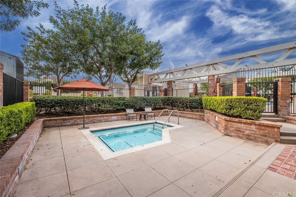 3 Descanso Irvine, CA 92620 - Photo 45 of 54 a view of swimming pool with outdoor seating and a garden
