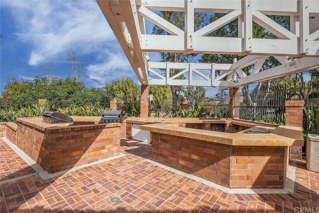 3 Descanso Irvine, CA 92620 - Photo 47 of 54 a view of a swimming pool with a patio