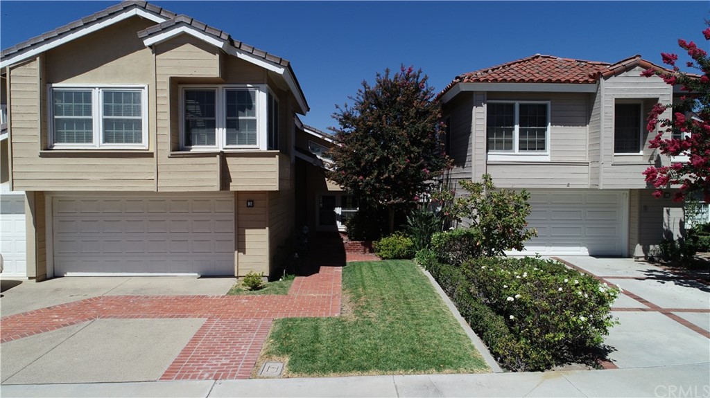 3 Descanso Irvine, CA 92620 - Photo 50 of 54 a front view of a house with a yard
