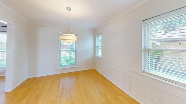 a view of a room with windows