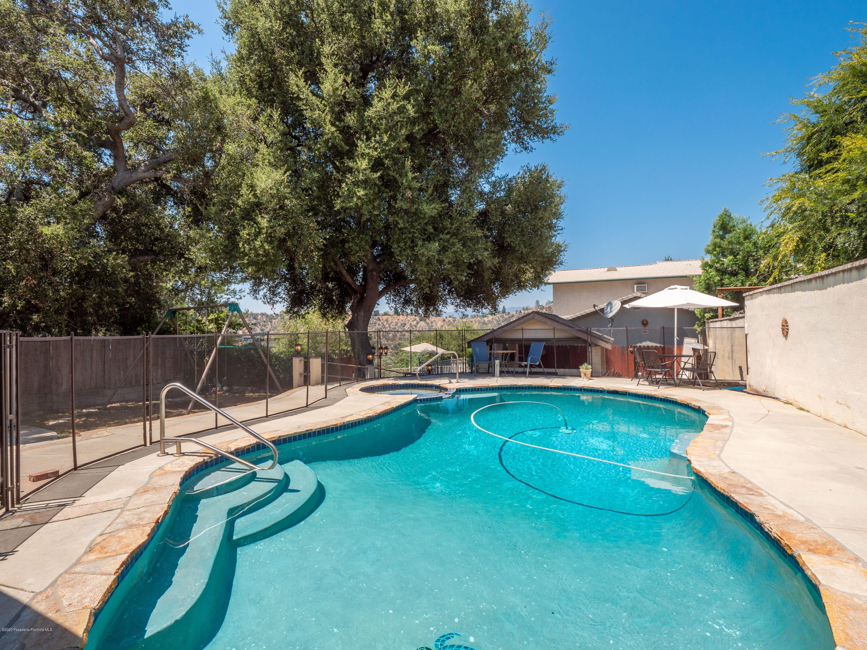 4191 Aralia Road Altadena, CA 91001 - Photo 1 of 26 swimming pool with outdoor seating and yard