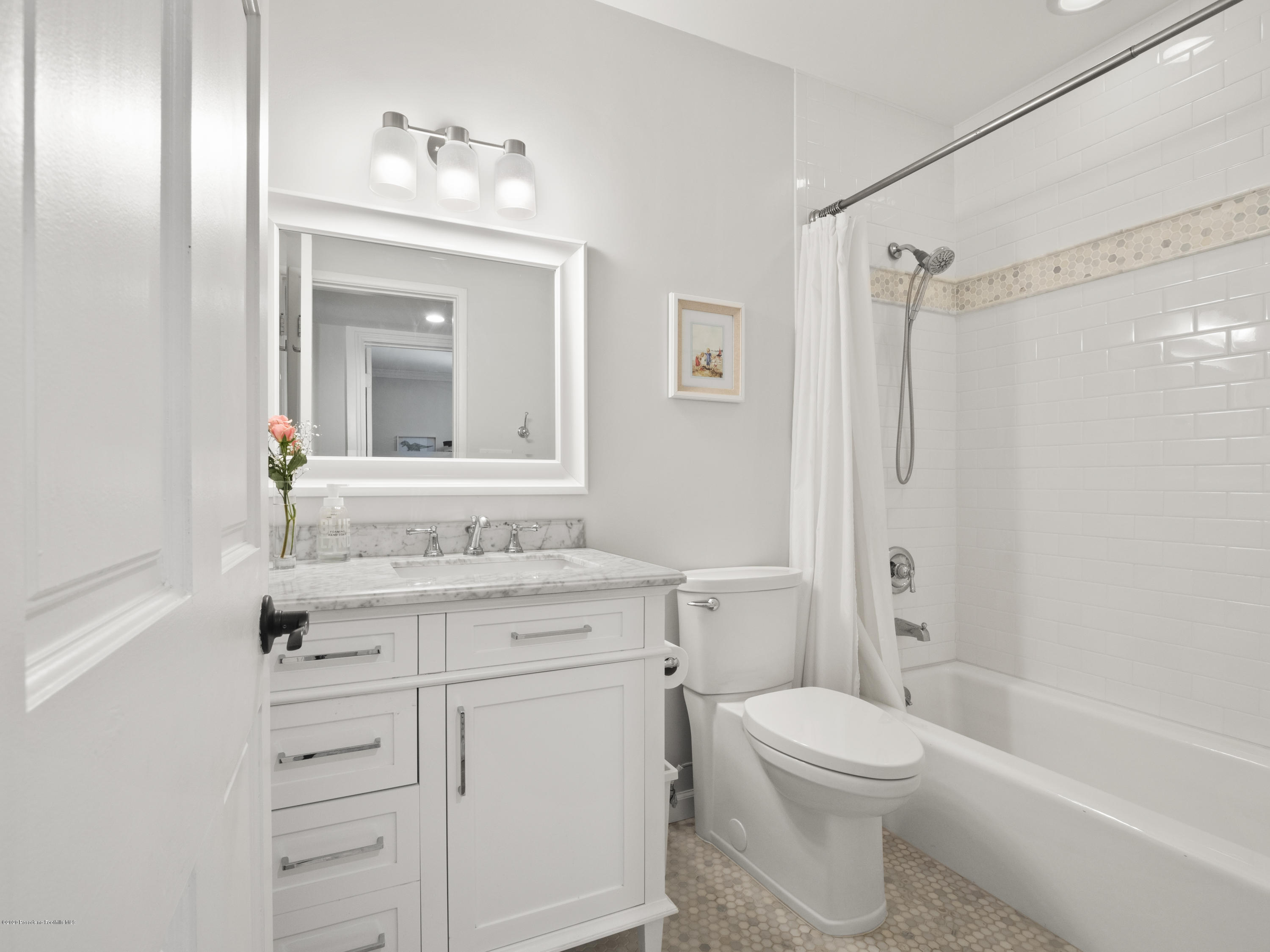 4191 Aralia Road Altadena, CA 91001 - Photo 12 of 26 a bathroom with a sink a toilet and shower