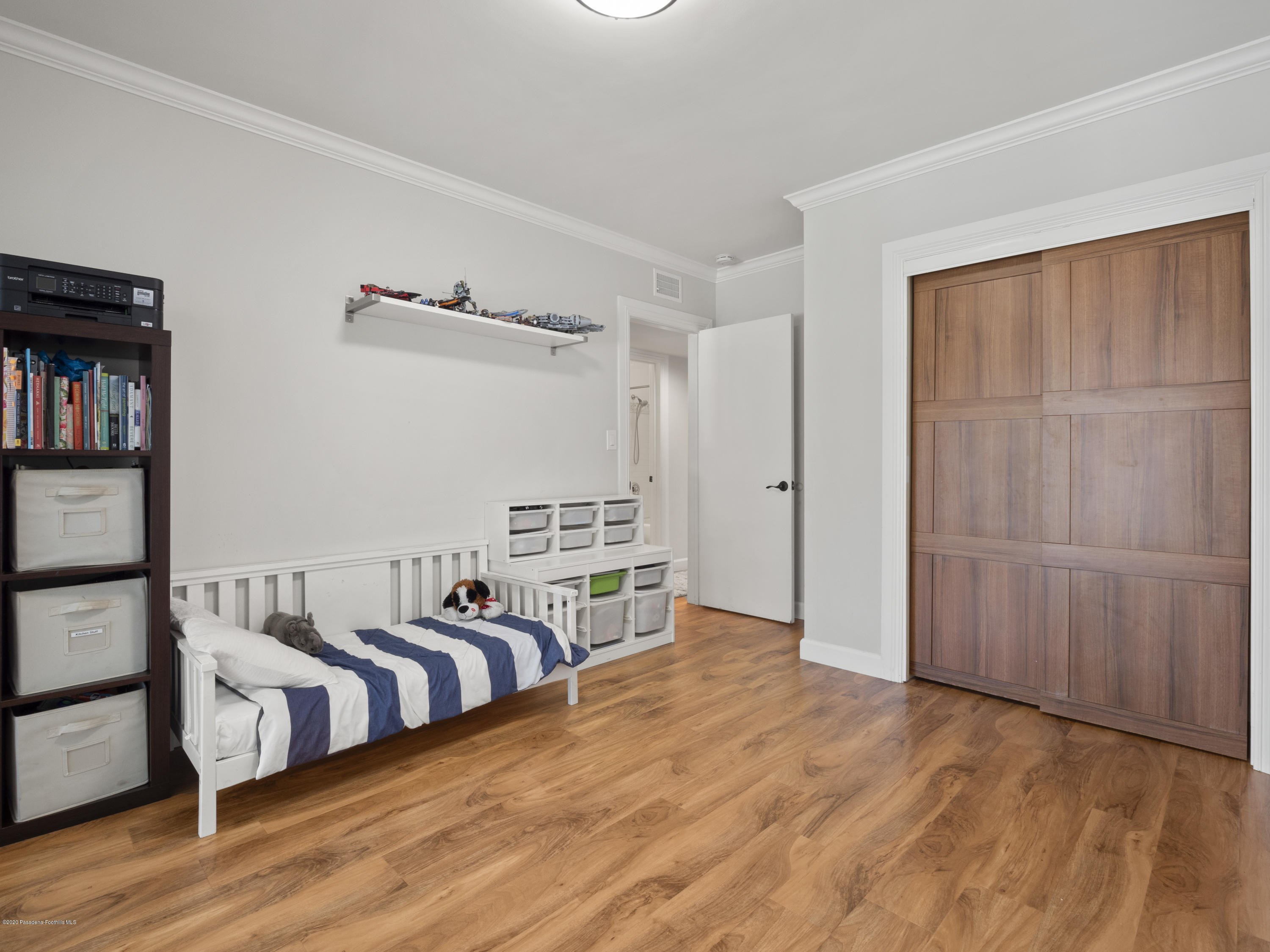 4191 Aralia Road Altadena, CA 91001 - Photo 14 of 26 a view of a bedroom with furniture and staircase