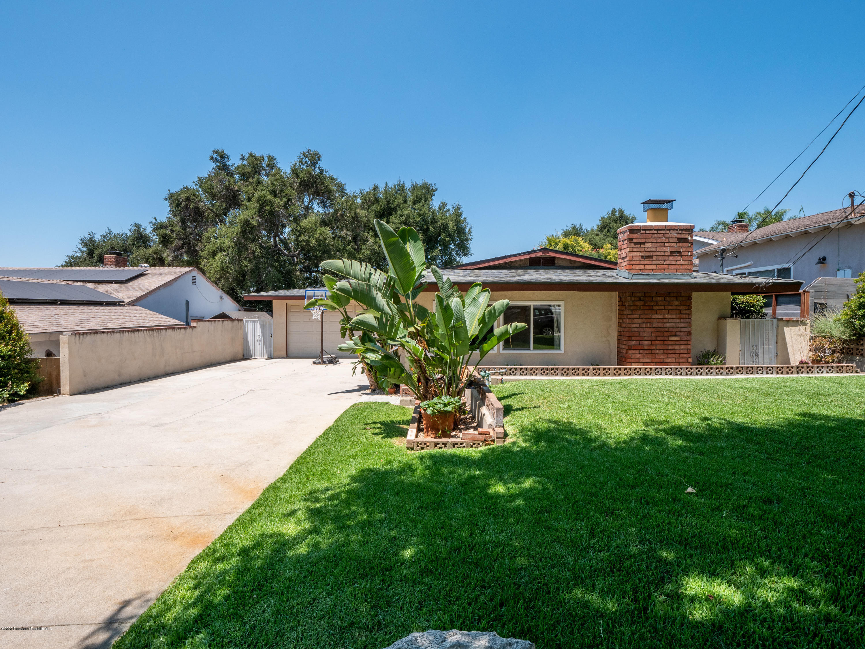 4191 Aralia Road Altadena, CA 91001 - Photo 3 of 26 a front view of a house with garden