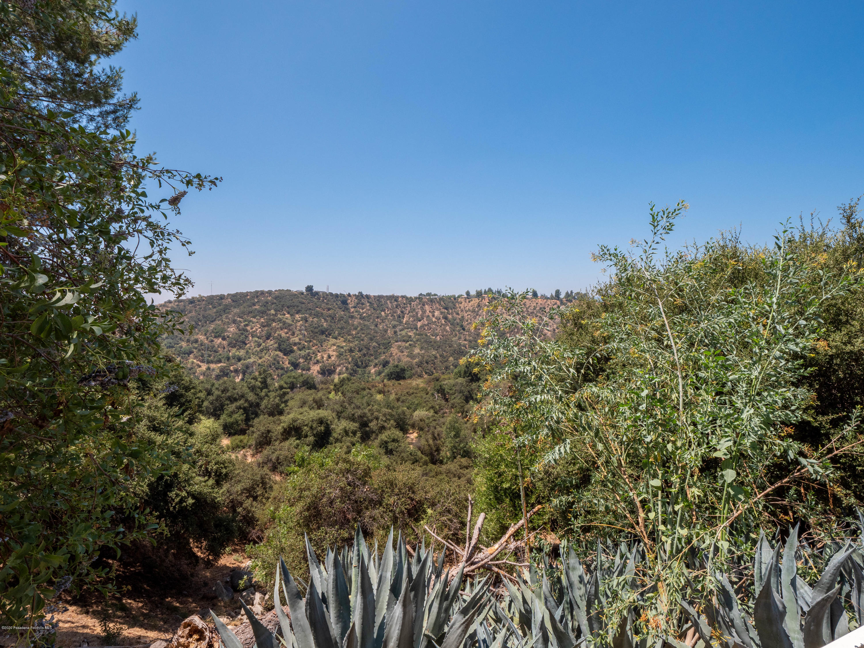 4191 Aralia Road Altadena, CA 91001 - Photo 25 of 26 a view of a large building with a mountain in the background