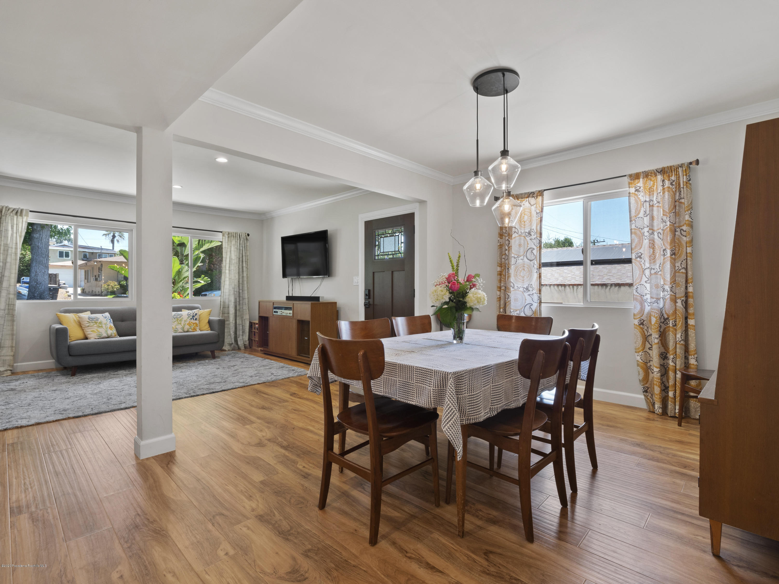 4191 Aralia Road Altadena, CA 91001 - Photo 5 of 26 a view of a dining room with furniture window and wooden floor