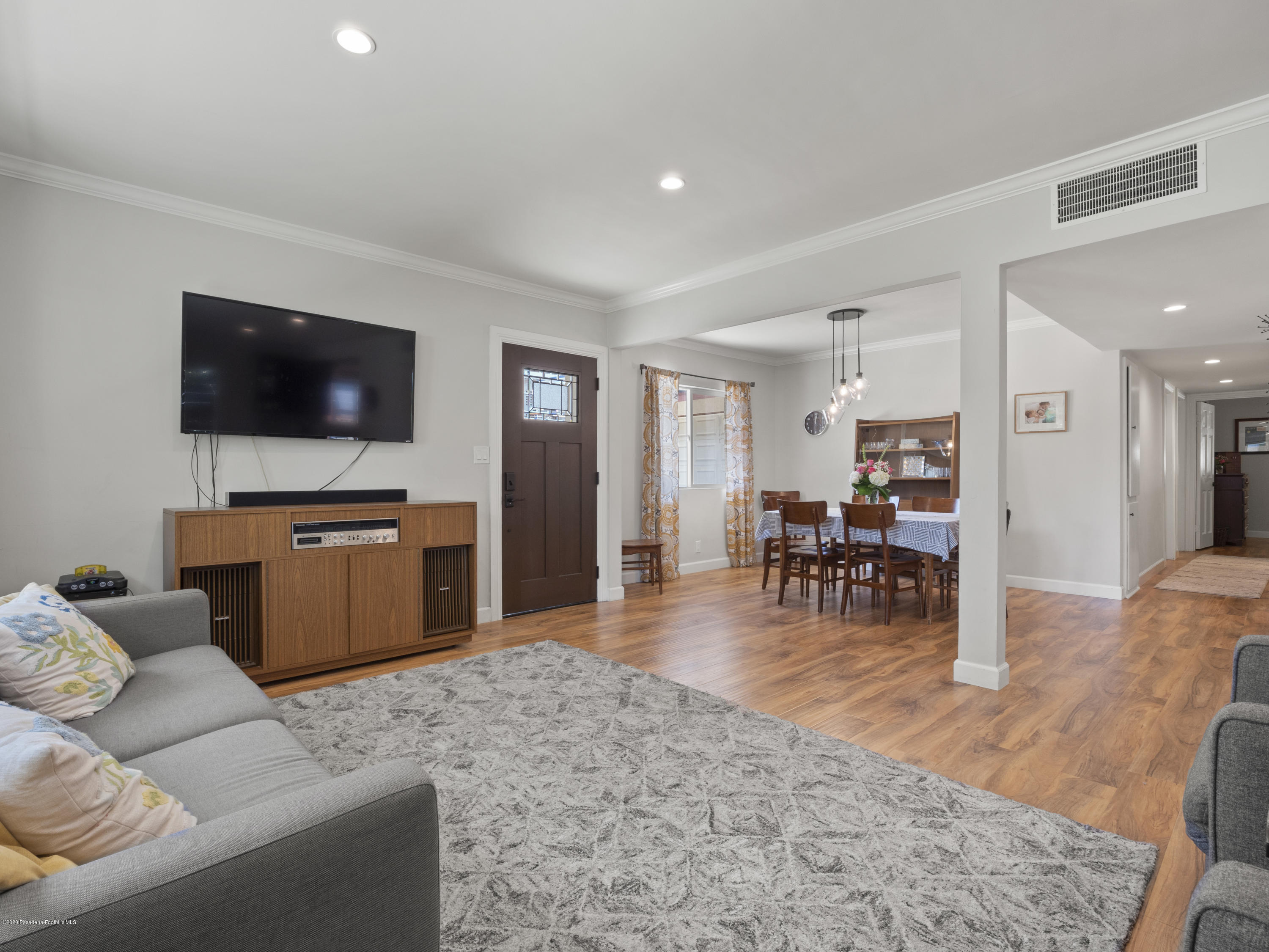 4191 Aralia Road Altadena, CA 91001 - Photo 7 of 26 a living room with furniture and a flat screen tv