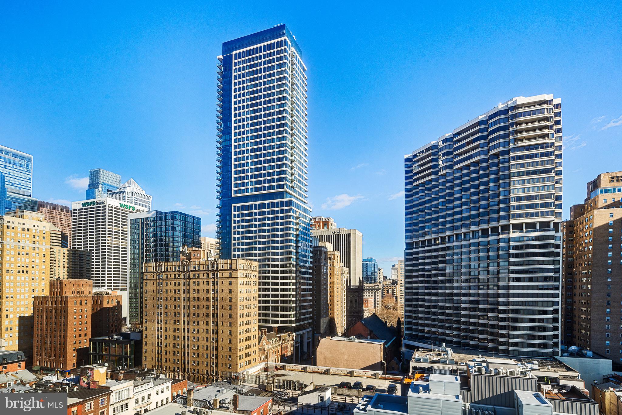 2018 Walnut Street, Unit 16E Philadelphia, PA 19103 - Photo 12 of 35 a view of a city with tall buildings