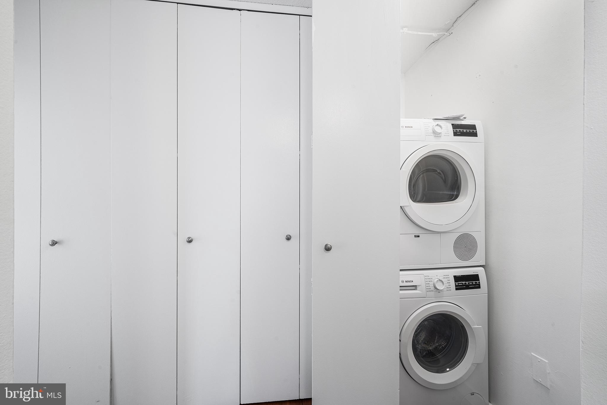 2018 Walnut Street, Unit 16E Philadelphia, PA 19103 - Photo 27 of 35 a utility room with dryer and washer