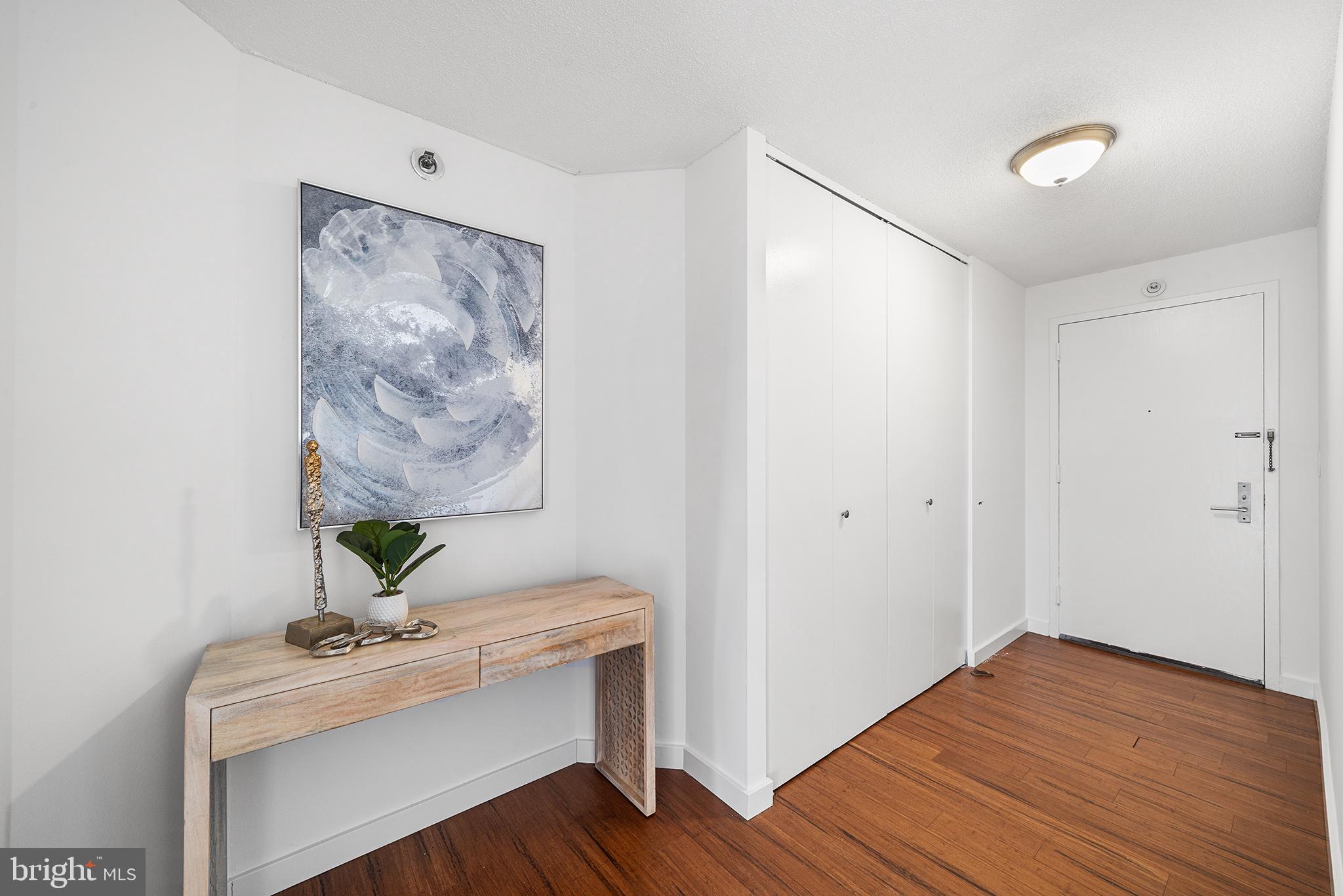2018 Walnut Street, Unit 16E Philadelphia, PA 19103 - Photo 30 of 35 a view of room with a hardwood floor and cabinet