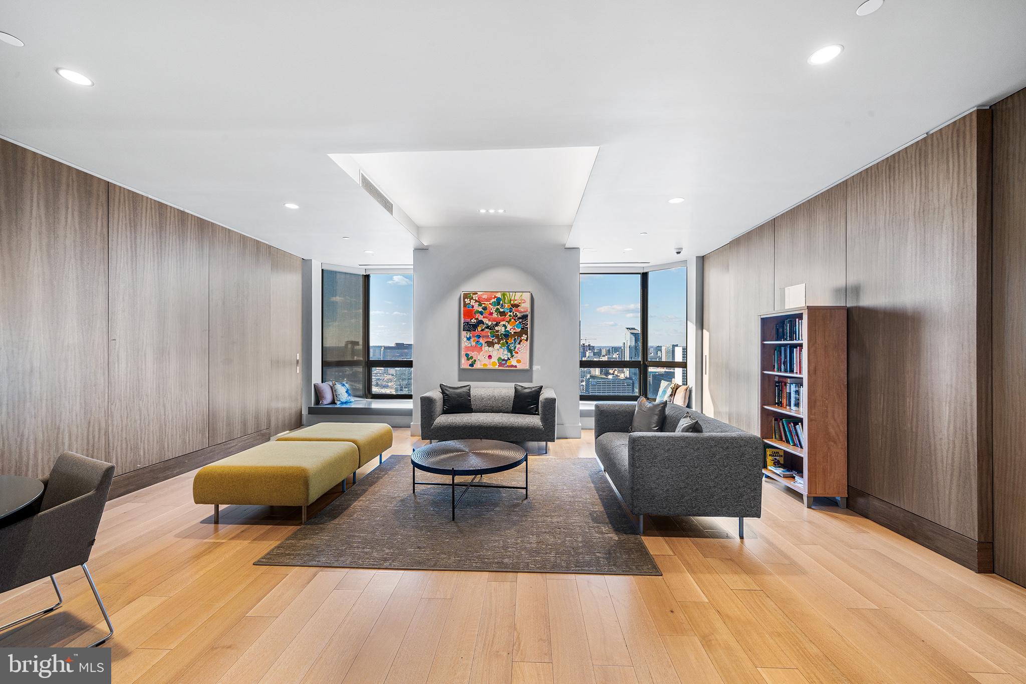 2018 Walnut Street, Unit 16E Philadelphia, PA 19103 - Photo 35 of 35 a living room with furniture and a window