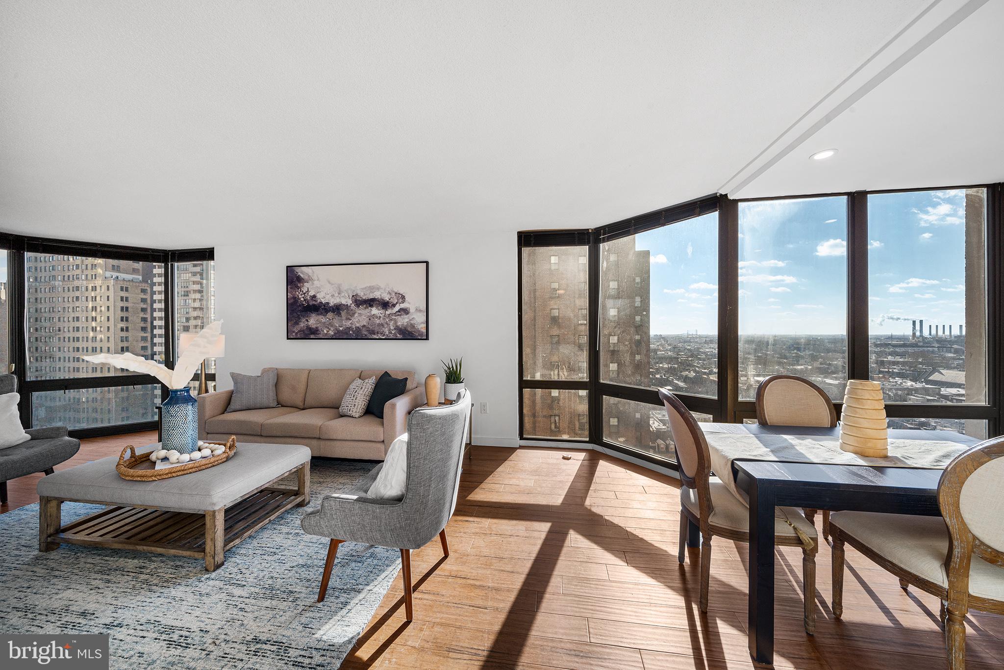 2018 Walnut Street, Unit 16E Philadelphia, PA 19103 - Photo 8 of 35 a living room with furniture and a large window