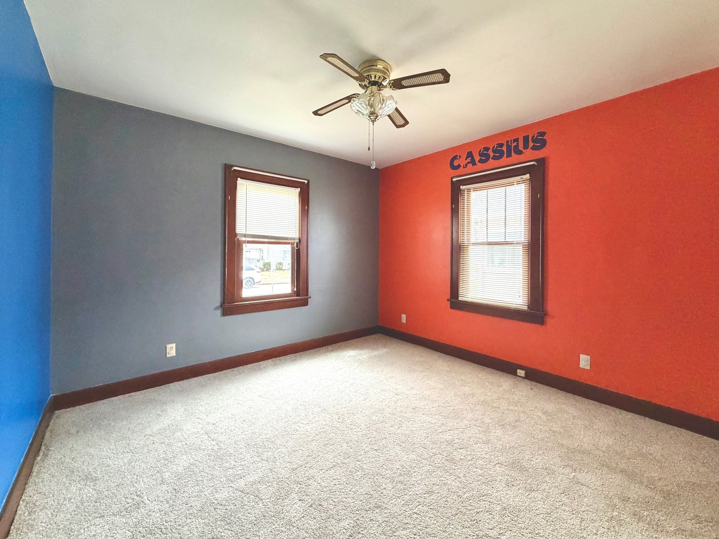 422 45th Street Moline, IL 61265 - Photo 13 of 22 an empty room with windows and fan