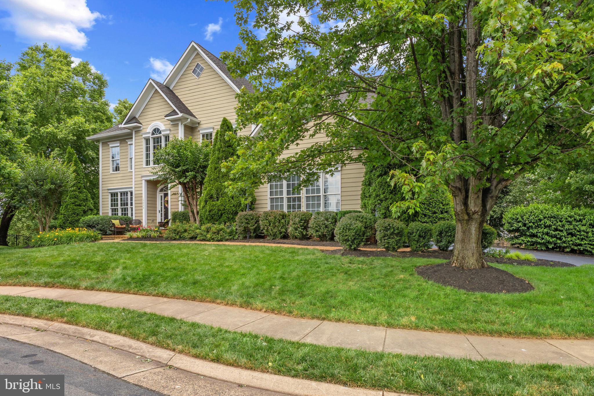 15006 Ransom Oaks Court Gainesville, VA 20155 - Photo 2 of 57 Charming home nestled in lush greenery.