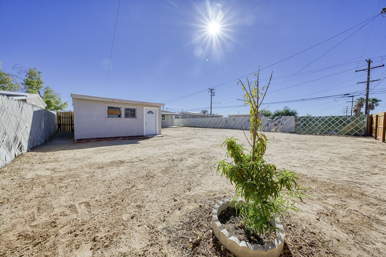 305 North Warner Street Ridgecrest, CA 93555 - Photo 27 of 30 a view of a backyard of the house