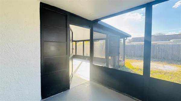 a view of an empty room with window
