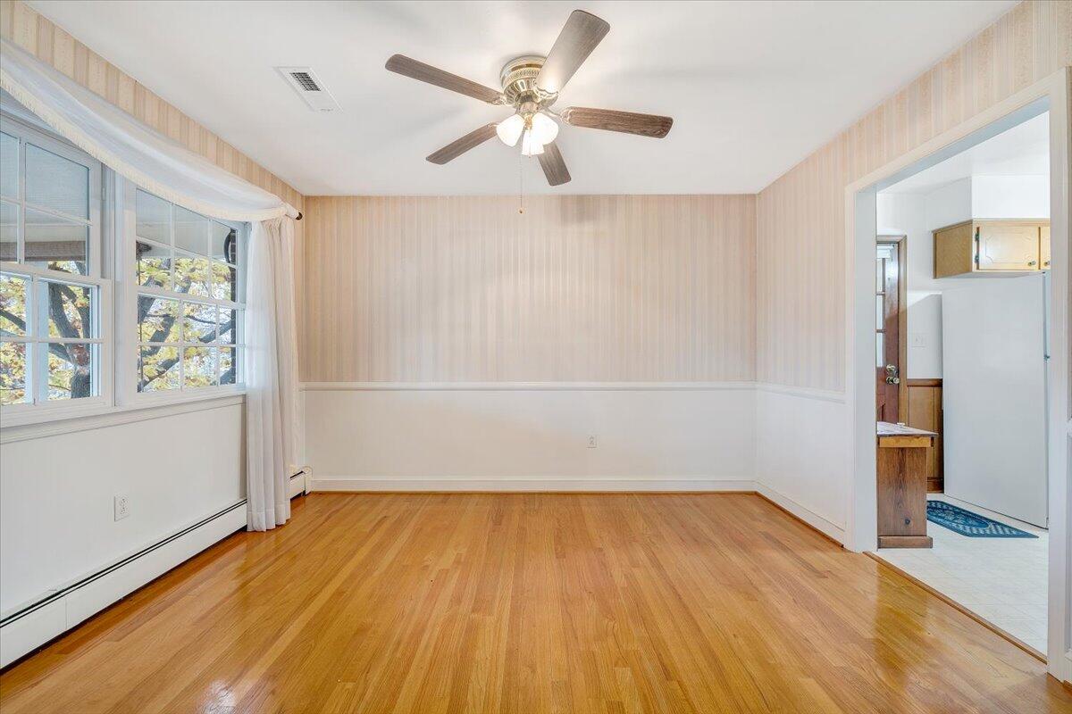 709 Olney Road Vinton, VA 24179 - Photo 11 of 41 wooden floor in an empty room with a window