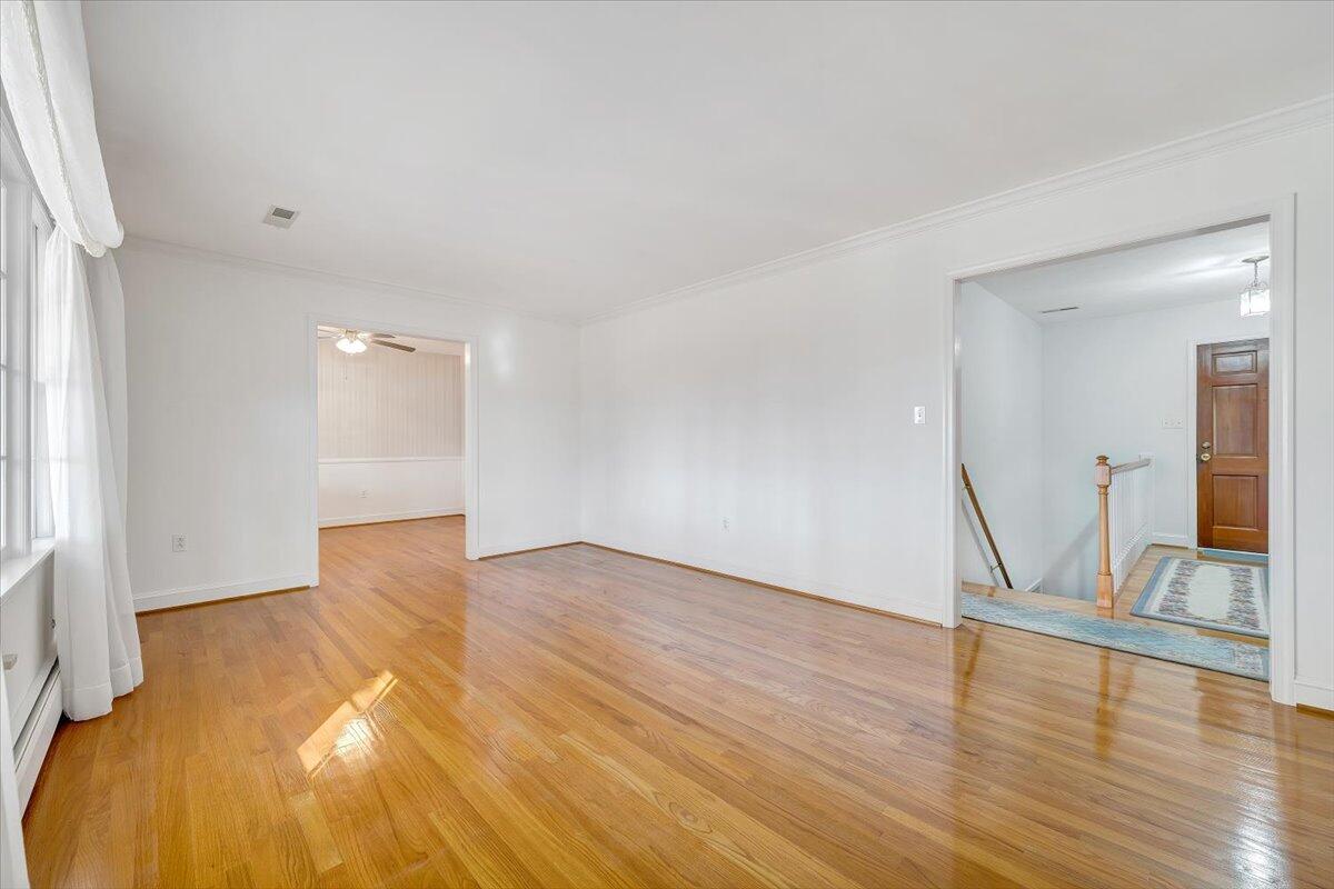 709 Olney Road Vinton, VA 24179 - Photo 13 of 41 a view of empty room with wooden floor