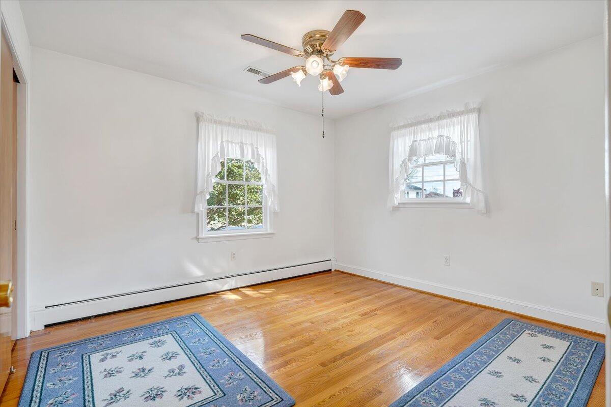 709 Olney Road Vinton, VA 24179 - Photo 16 of 41 wooden floor in a room next to a window