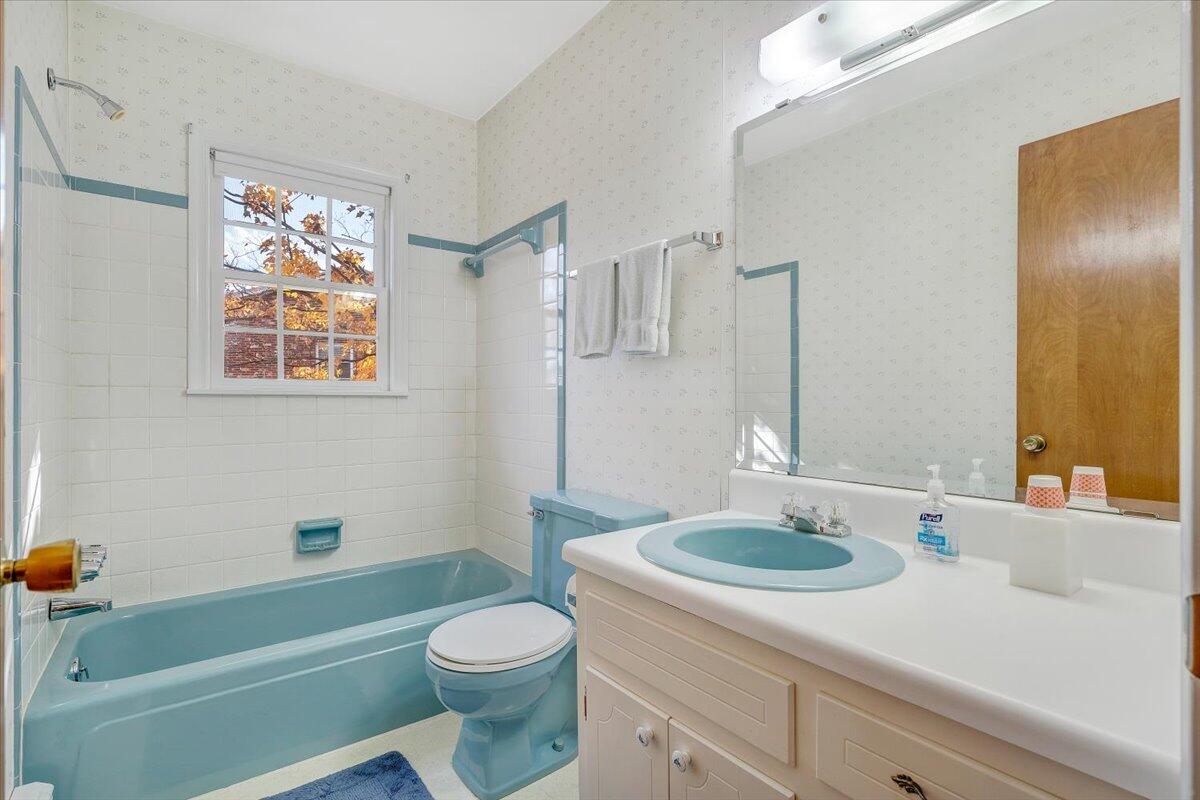 709 Olney Road Vinton, VA 24179 - Photo 19 of 41 a bathroom with a sink a toilet and a bathtub