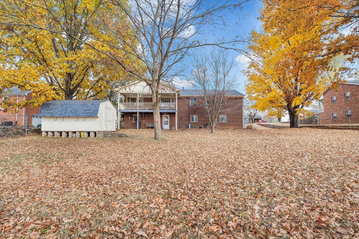 709 Olney Road Vinton, VA 24179 - Photo 35 of 41 front view of a house with a large tree