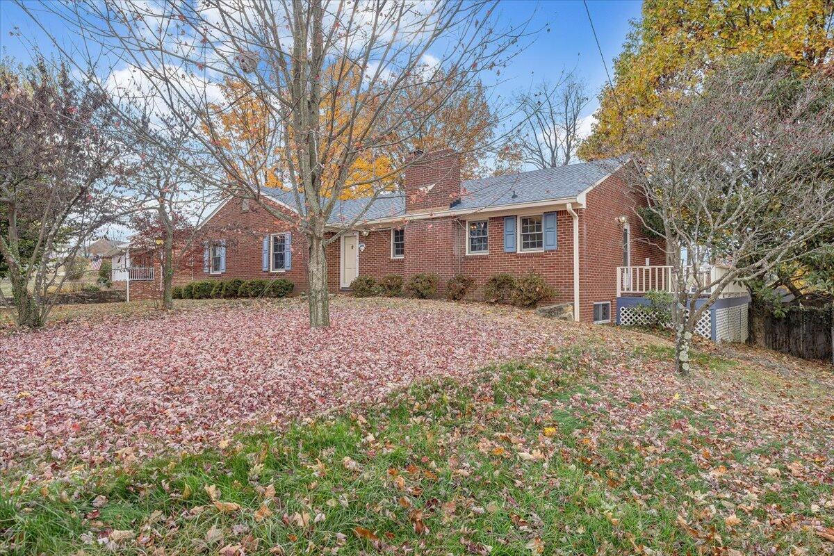 709 Olney Road Vinton, VA 24179 - Photo 38 of 41 front view of a house with a yard