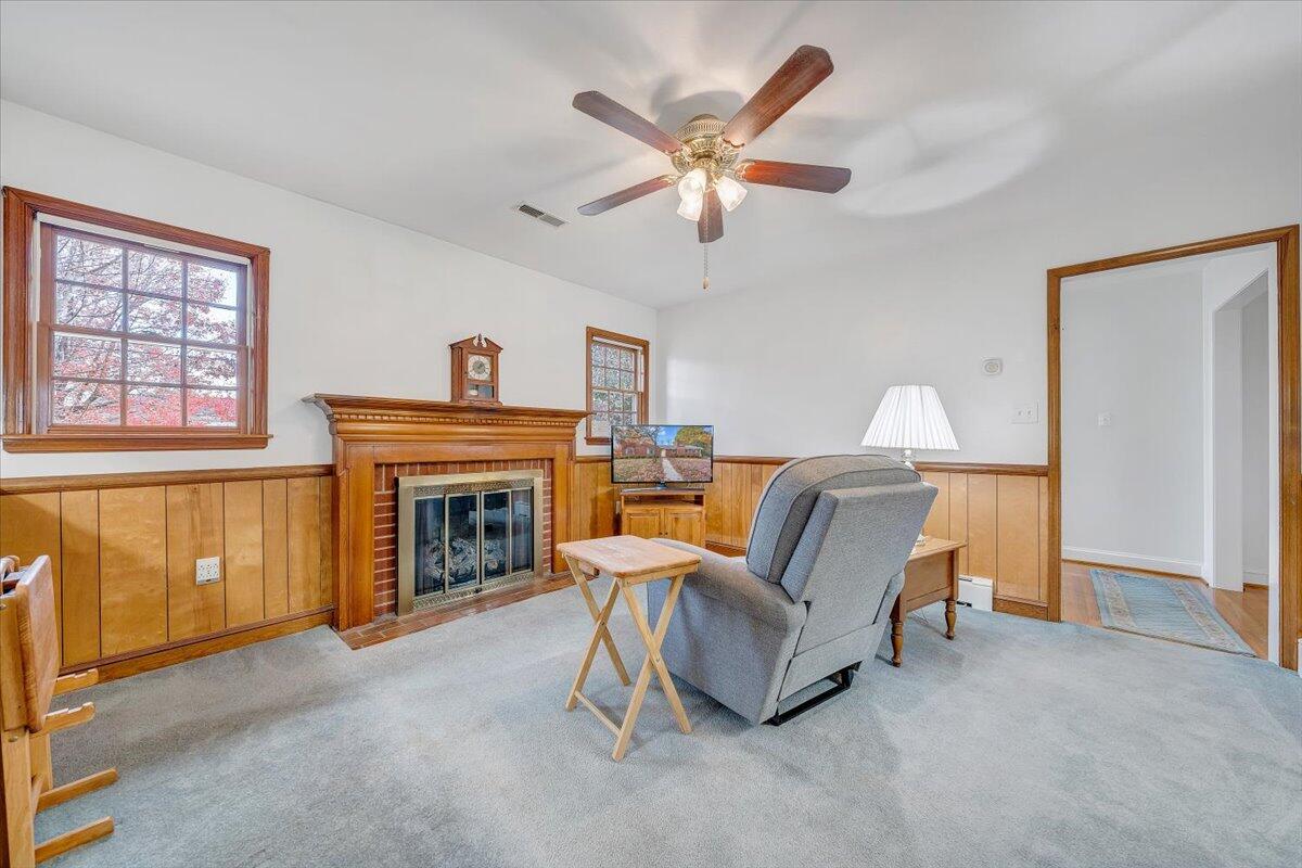 709 Olney Road Vinton, VA 24179 - Photo 5 of 41 a living room with furniture and a fireplace