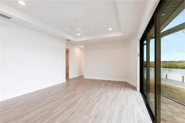 a spacious bathroom with a double vanity sink and a mirror