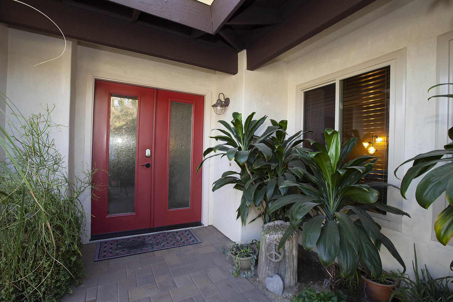 72861 Haystack Road Palm Desert, CA 92260 - Photo 13 of 45 a potted plant in front of a house