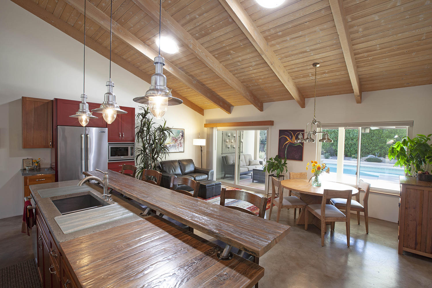 72861 Haystack Road Palm Desert, CA 92260 - Photo 17 of 45 a living room with patio furniture and a fireplace