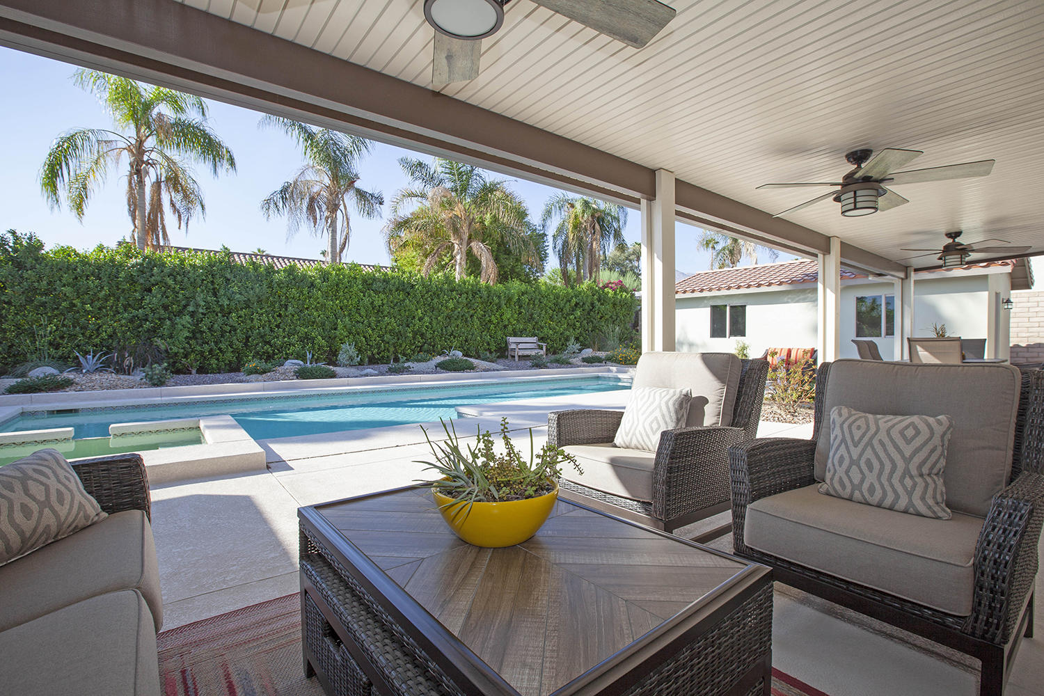 72861 Haystack Road Palm Desert, CA 92260 - Photo 2 of 45 a living room with furniture and a large window