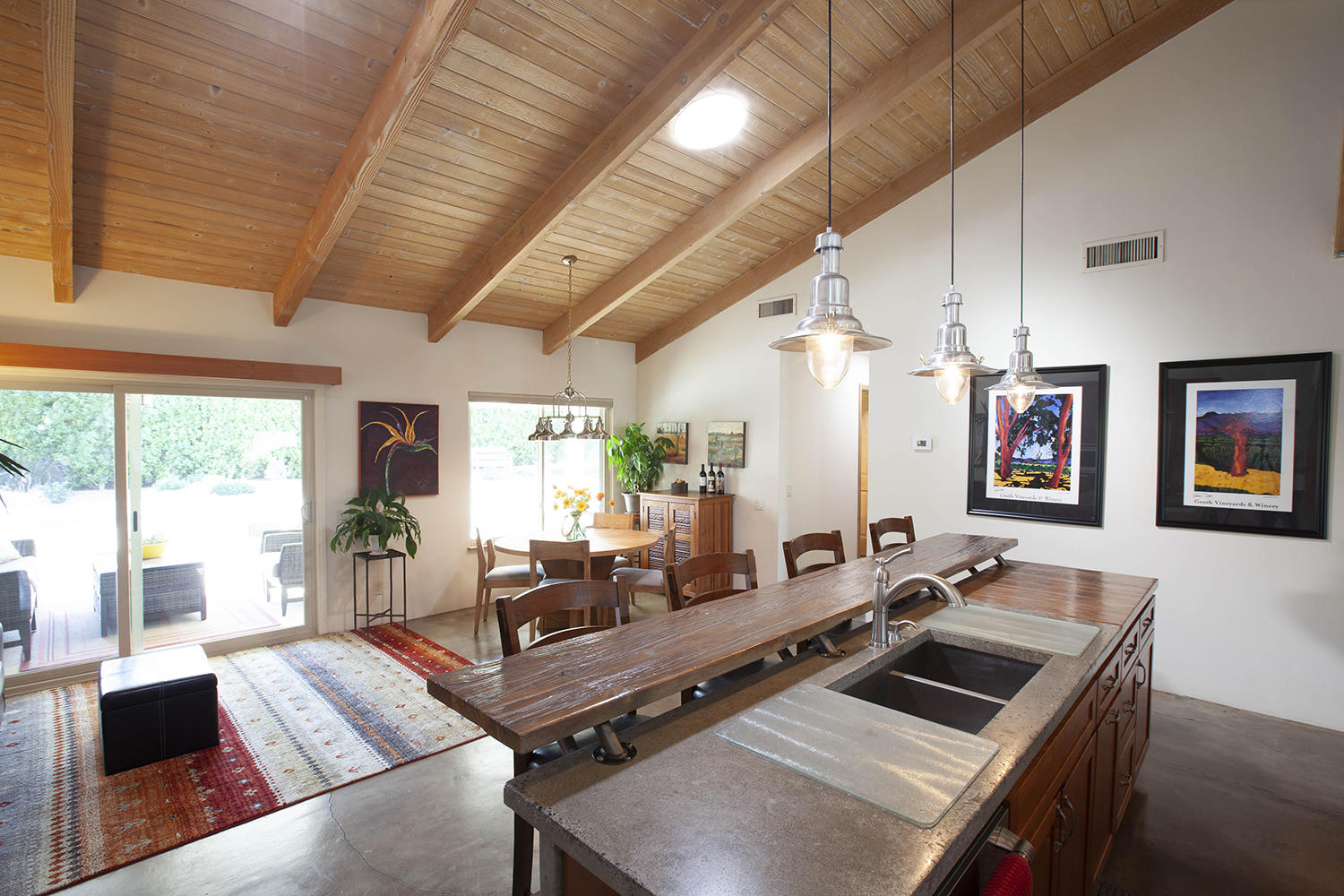 72861 Haystack Road Palm Desert, CA 92260 - Photo 21 of 45 a living room with furniture a flat screen tv and a large window