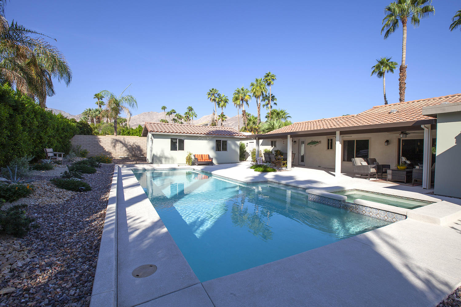 72861 Haystack Road Palm Desert, CA 92260 - Photo 4 of 45 a view of a house with backyard porch and patio