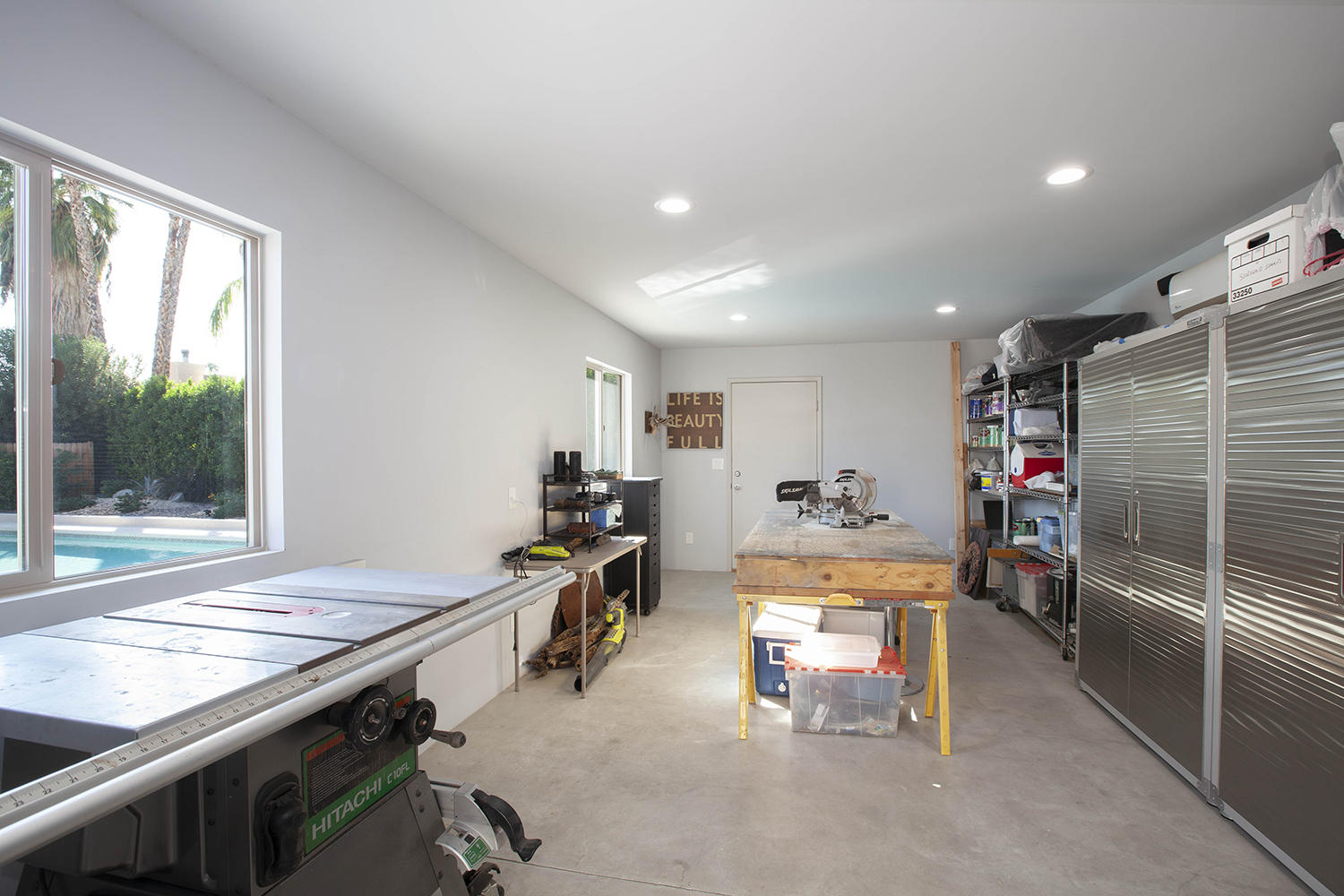 72861 Haystack Road Palm Desert, CA 92260 - Photo 42 of 45 a room with furniture and a window
