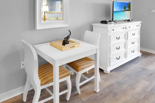 a bedroom with a bed and a cabinets