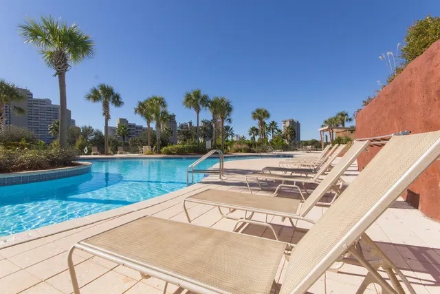 a view of a swimming pool with a lake view