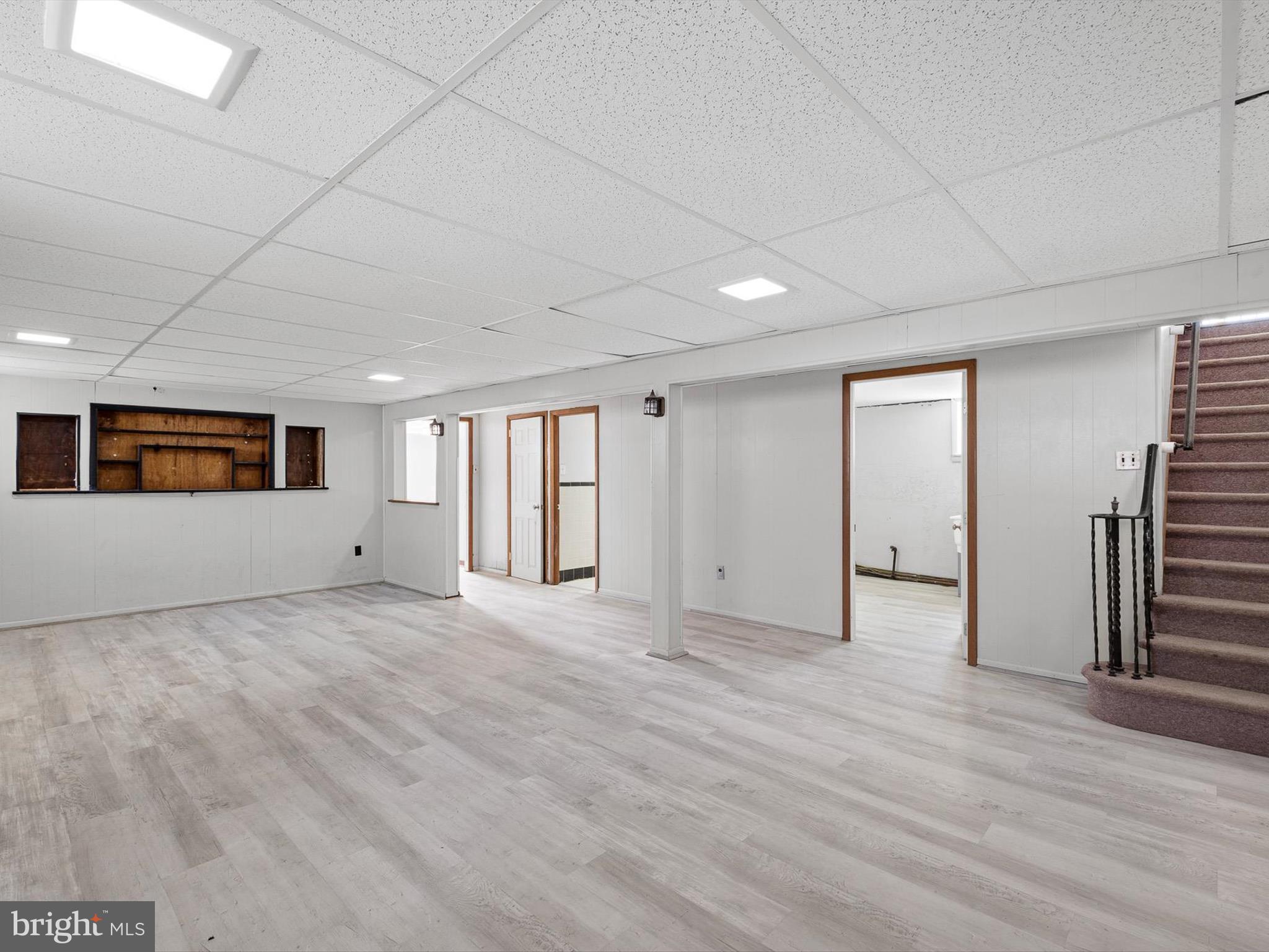 1802 Hettering Road Wilmington, DE 19810 - Photo 18 of 29 a view of a livingroom with wooden floor and windows