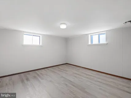 a view of an house with backyard space and garden